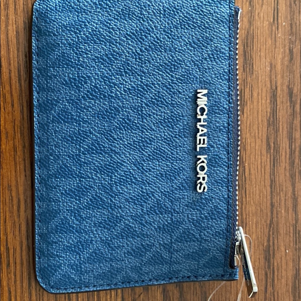 Blue Michael Kors travel wallet